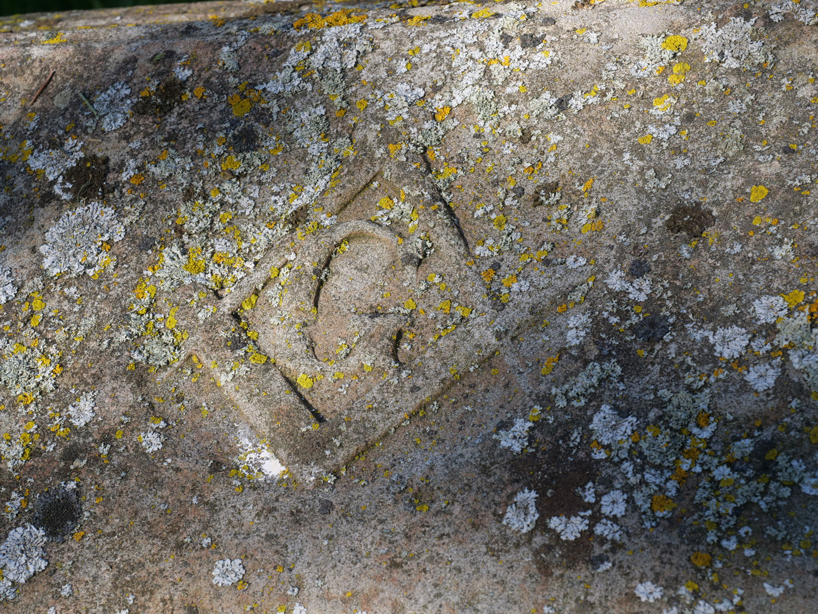 The Square & Compasses is still visible on the top of Thomas Carter's grave in Pioneer Square, Victoria, B.C.. [photo: Vancouver & Quadra Lodge No. 2 Historian]