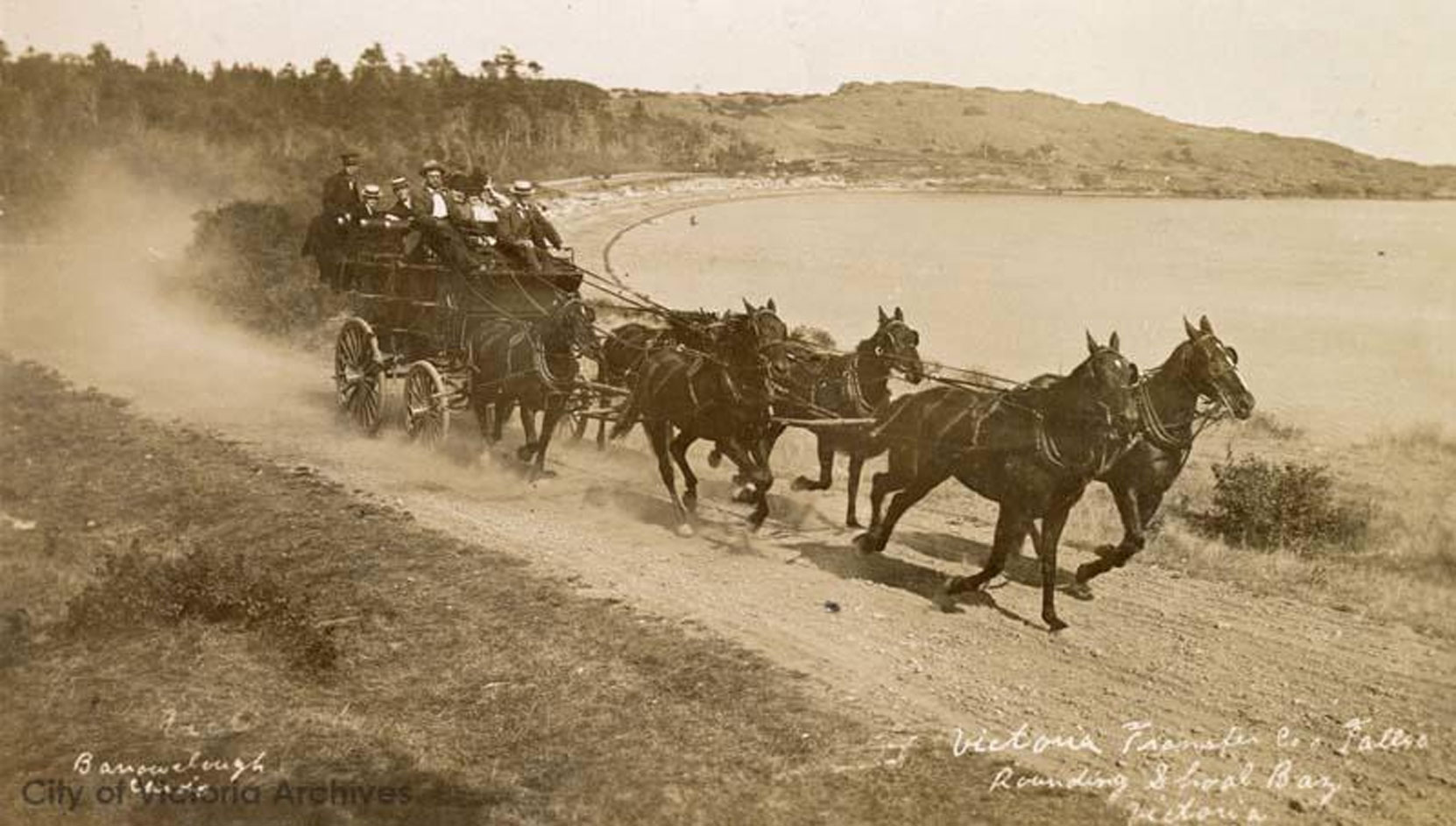 The Victoria Transfer Company's Tally Ho sightseeing tour at Shoal Bay on the Victoria waterfront, circa 1905. The Victoria Transfer Company was operated at this time by Francis Stilman Barnard, Anton Henderson and Joseph Rostein, all members of Victoria-Columbia Lodge No. 1 [City of Victoria Archives photo M00754]